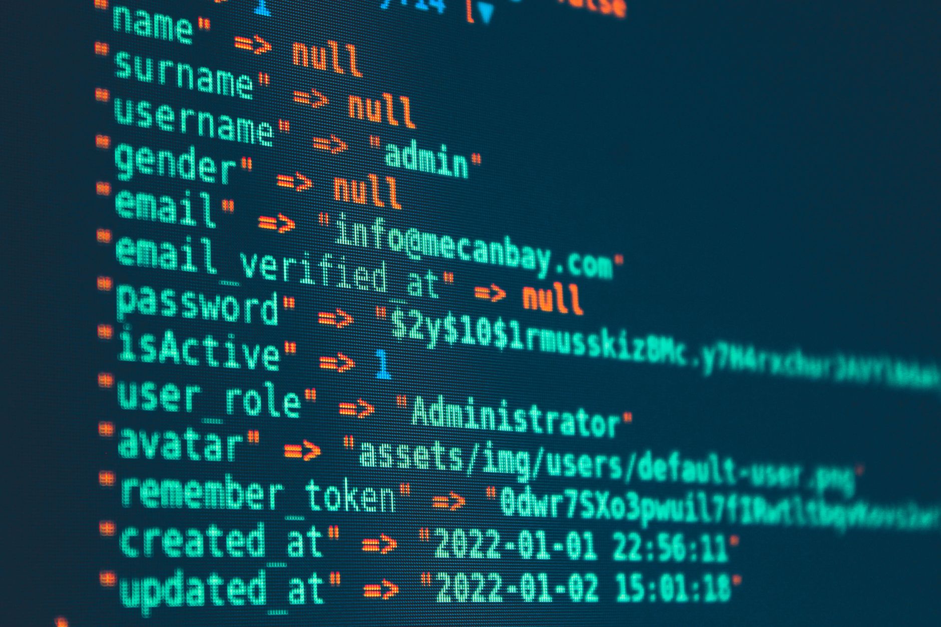 Vibrant close-up of code displayed on a monitor with various programming details.